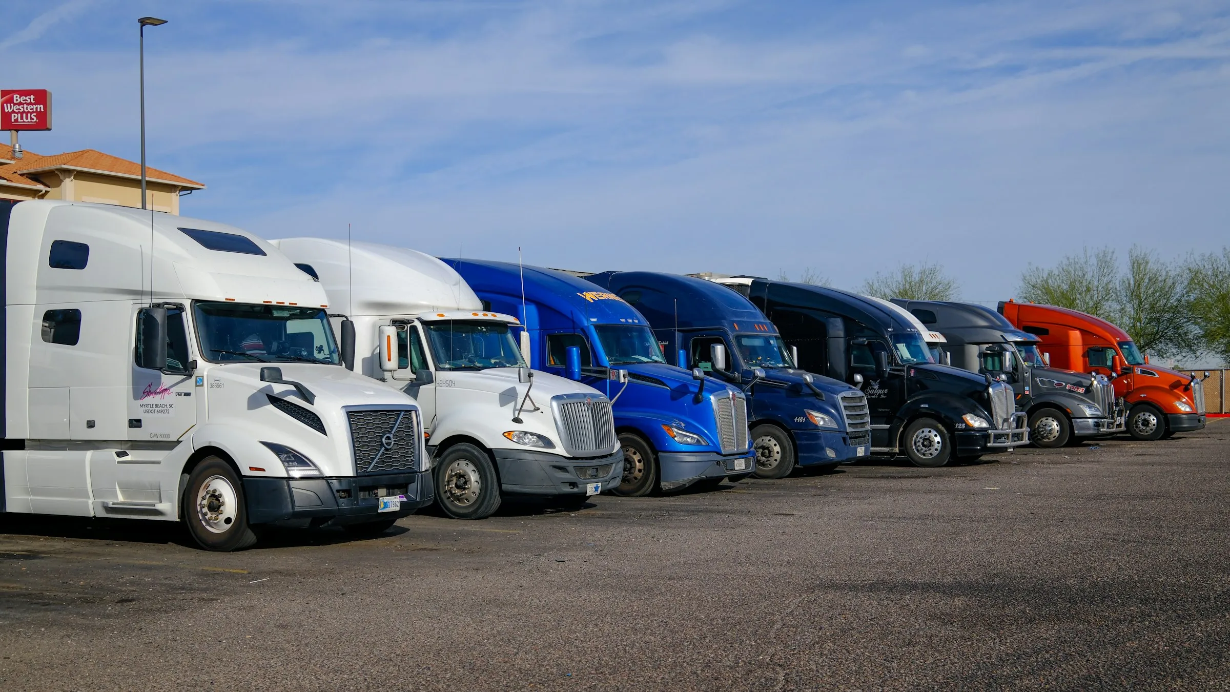 Row of company trucks in the yard